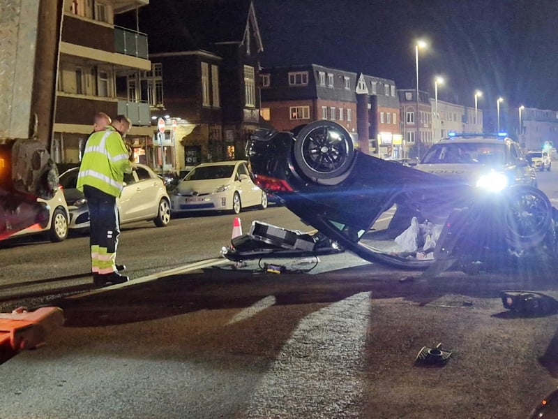 Pictures show a car had overturned in a crash in London Road, Hilsea. Picture: Habibur Rahman.