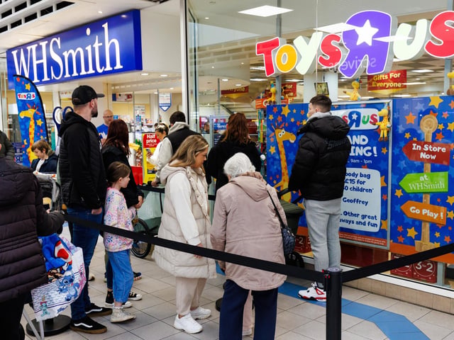 Families queued ahead of the opening of the store with the first 50 children receiving goodie bags.