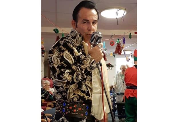 Elvis tribute artist Kevin Wright from Warren Park performed a rooftop gig to entertain his neighbours