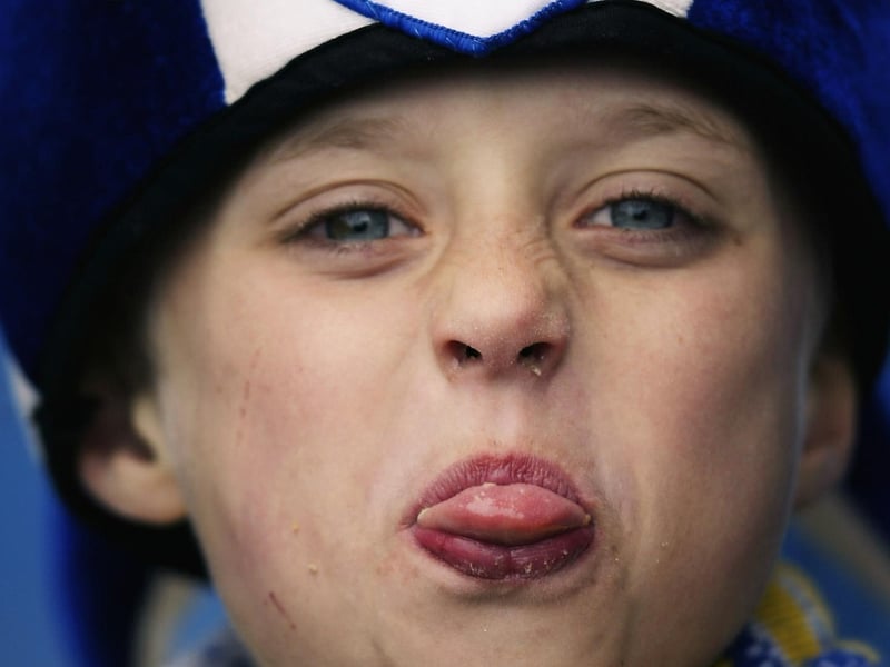 A young Pompey fan sticks their tongue out during Sheffield Wednesday's visit to Fratton Park in April 2003. Photo by Clive Rose/Getty Images