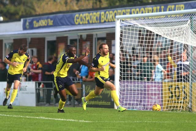 Theo Widdrington celebrates his leveller against Tiverton. Picture: Tom Phillips