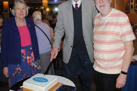 PATN 50th Anniversary cake cutting, Christopher Golding (centre), Janet Crabtree and Trevor Muston