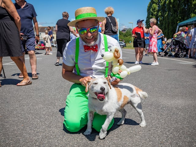 Rob Driscoll (the 'Bow Tie Balloon Guy') with Nelson - the dog who provided the inspiration for his latest creation. Picture: Mike Cooter (240623)