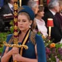Lord President of the Council, Penny Mordaunt, carrying the Sword of State, in the procession through Westminster Abbey ahead of the coronation ceremony of King Charles III and Queen Camilla in London. Picture: PA