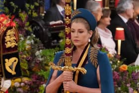 Lord President of the Council, Penny Mordaunt, carrying the Sword of State, in the procession through Westminster Abbey ahead of the coronation ceremony of King Charles III and Queen Camilla in London. Picture: PA