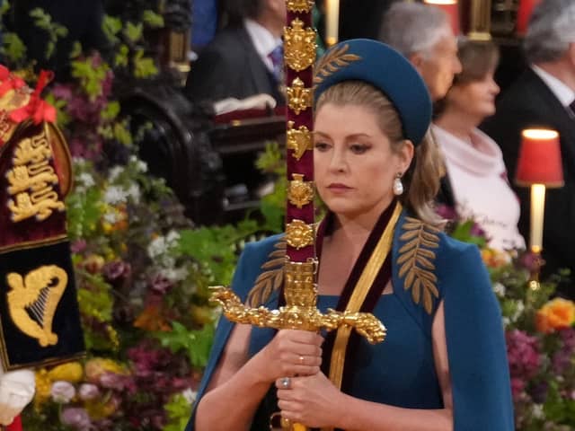 Lord President of the Council, Penny Mordaunt, carrying the Sword of State, in the procession through Westminster Abbey ahead of the coronation ceremony of King Charles III and Queen Camilla in London. Picture: PA