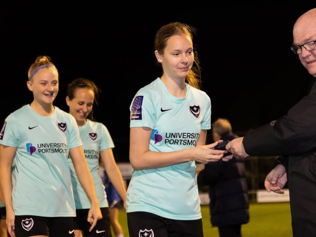 Portsmouth players presented with their winners medals. Picture by Alex Shute