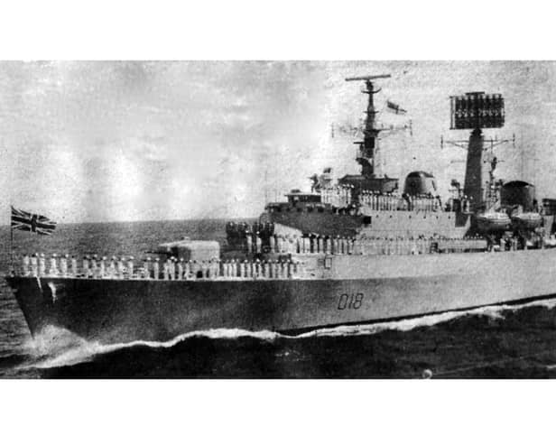 HMS Antrim's company gives three cheers to the Queen as the ship steams past Britannia. Picture: Gordon Walwyn collection.