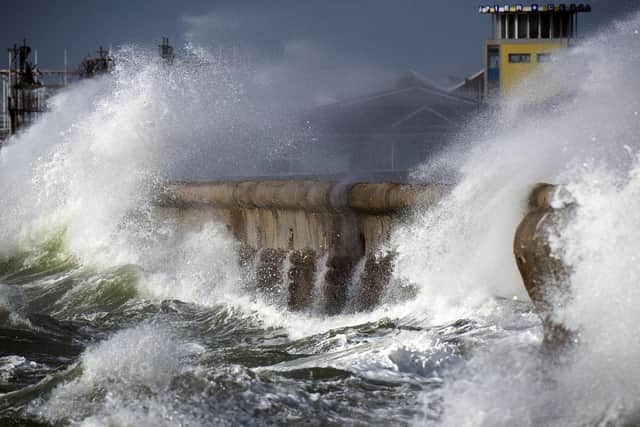 Waves battering the sea defences in Southsea during Storm Brian in 2017. Picture: Lou Louis