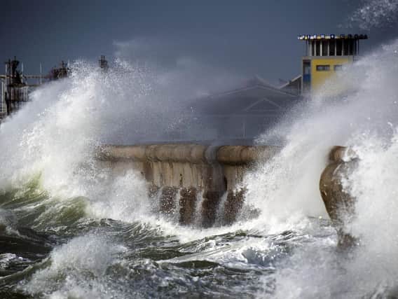 Waves battering the sea defences in Southsea during Storm Brian in 2017. Picture: Lou Louis
