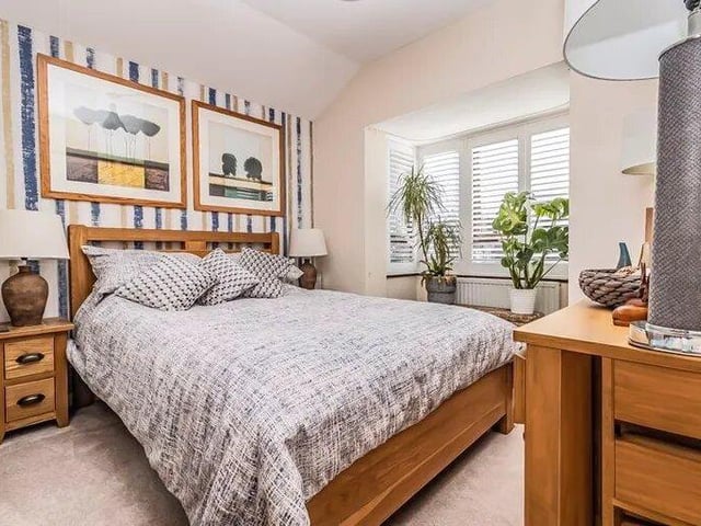 This property comes with two bedrooms, two bathrooms and a reception room as well as parking.