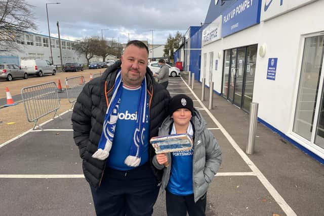 Pompey fan Matt Mennell and his son Jackson at today's game