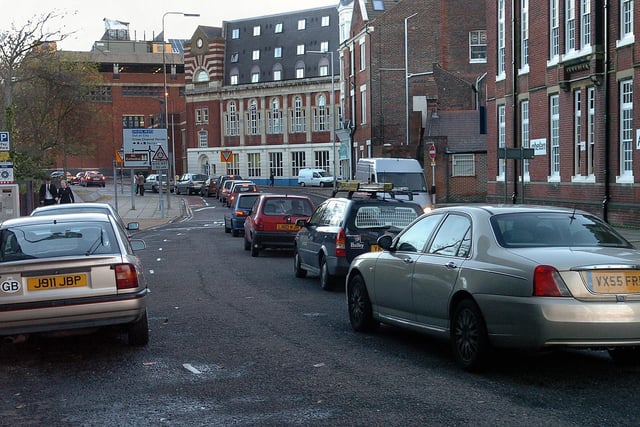 Queues starting from Commercial Road South and Stanhope Road in 2006, of motorists waiting for the traffic lights at the junction of Unicorn Road, Landport, with Alfred Road and Market Way. The lights give a long wait at red, then only 12-15 seconds at green. Vehicles and motorists often have to wait two or three changes, causing anger and delays for drivers (064969-0027)
