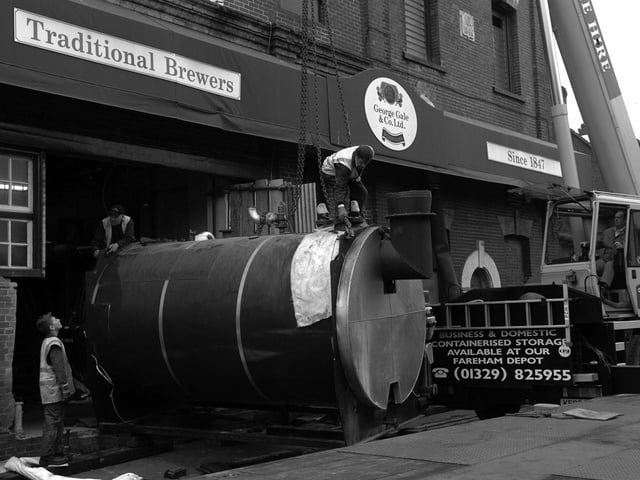 Kings Boiler Hire remove a boiler from the Gales Brewery in London Road, Horndean 14th May 2006. Picture: Jonathan Brady 062089-93