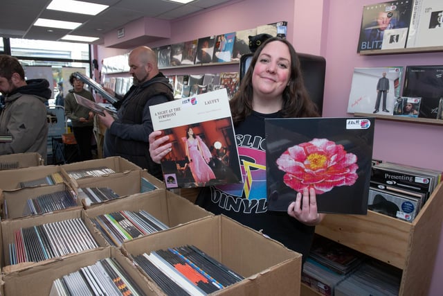 Emma Howes, owner of A Slice of Vinyl in Gosport, organising the hundreds of rare records released on Record Store Day.
