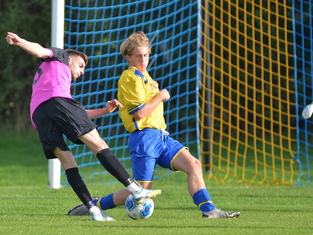Meon Milton (yellow) v Harvest. Picture by Martyn White