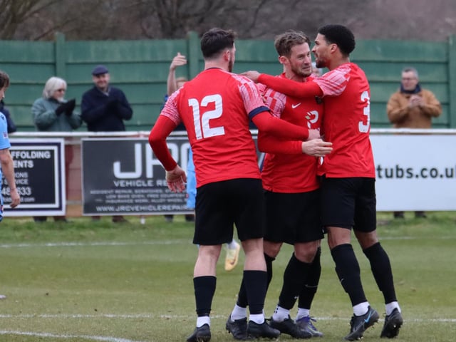Fareham's Tom Settle, middlle, has just converted a penalty to make it 2-2. Picture by Ken Walker