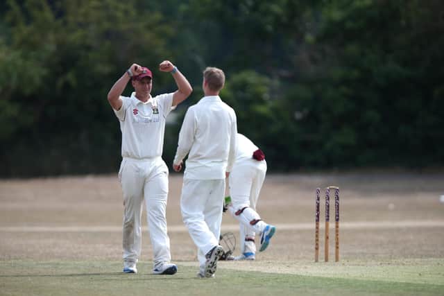 Fareham & Crofton celebrate a wicket against Bedhampton Mariners. Picture: Chris Moorhouse
