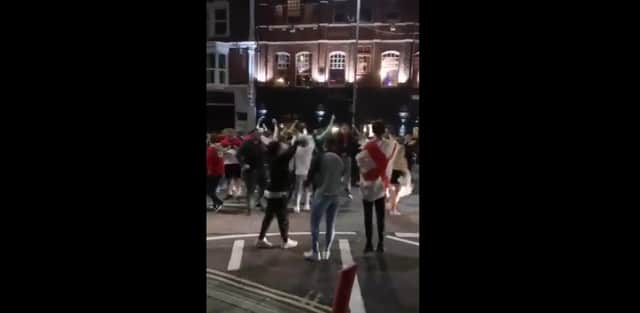 Police officers were called to Albert Road in Southsea after a large group congregated in the road on July 7 to ensure public safety. No arrests were made.
Pictured: A still from a video captured by Jake Fleming