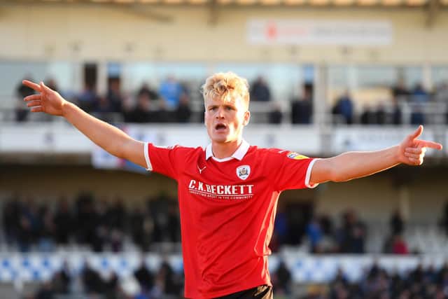Cameron McGeehan celebrates Barnsley's League One promotion. Picture: Harry Trump/Getty Images