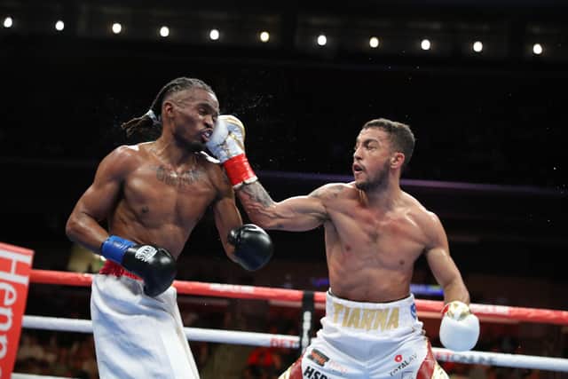 Mikey McKinson, right, lands a shot on Alex Martin in his American showdown in Los Angeles Picture: Golden Boy Promotions