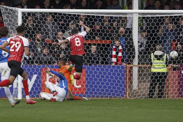 Liam Sercombe wins it for Cheltenham and scores against Pompey for the fourth time in his career.
