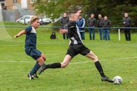 Harvest striker George Rough, right, in action for Hayling United. Picture: Vernon Nash