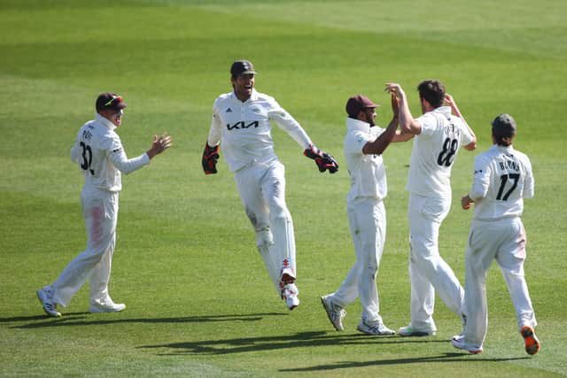 Jamie Overton celebrates with his teammates after dismissing Joe Weatherley during day three of the LV= Insurance County Championship match between Surrey and Hampshire at The Kia Oval . Photo by Jordan Mansfield/Getty Images for Surrey CCC.