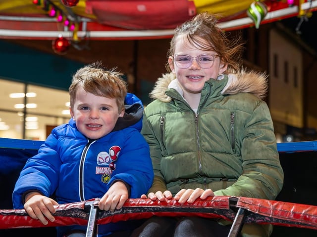 The crowds braved the wind and rain to watch the Christmas lights being switched on in Fareham highstreet on Saturday evening, while some of the entertainment was moved into the shopping centre.Pictured - Louis, 4 and Millie, 9 from FarehamPhotos by Alex Shute