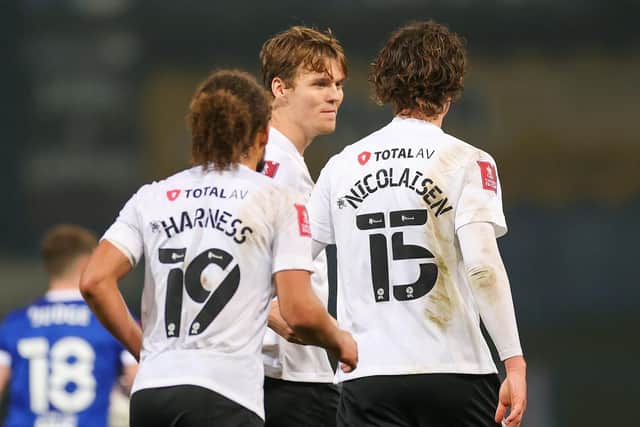 Pompey celebrate Sean Raggett's late winner at Ipswich. Picture: Nigel Keene