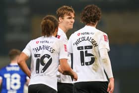 Pompey celebrate Sean Raggett's late winner at Ipswich. Picture: Nigel Keene