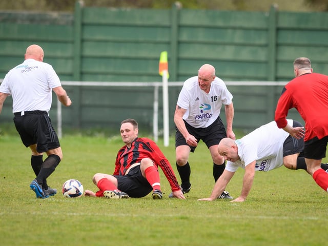 Action from the Jon Gittens memorial charity match between a team of former Fareham Town players and a side of ex-Pompey and Southampton professionals. Picture: Keith Woodland (160421-351)