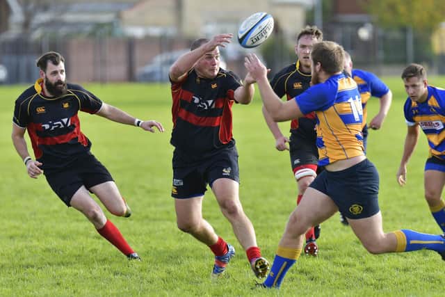 Mike Westall (middle) in action for Southsea Nomads against Romsey in Hampshire 2 in 2017. He has won chairman Ken Walker's award for season 2019/220. Picture: Neil Marshall