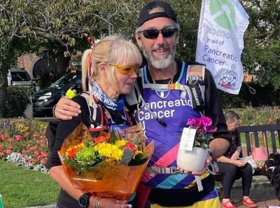 Tony Bennett and his partner Cherry Pirie after completing their walking challenge in Gosport. Pic: supplied