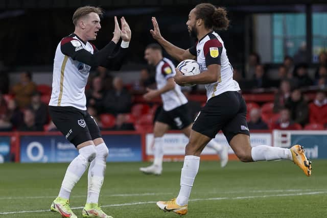 Marcus Harness celebrates with Ronan Curtis after netting Pompey's late leveller at Accrington. Picture: Daniel Chesterton/phcimages.com