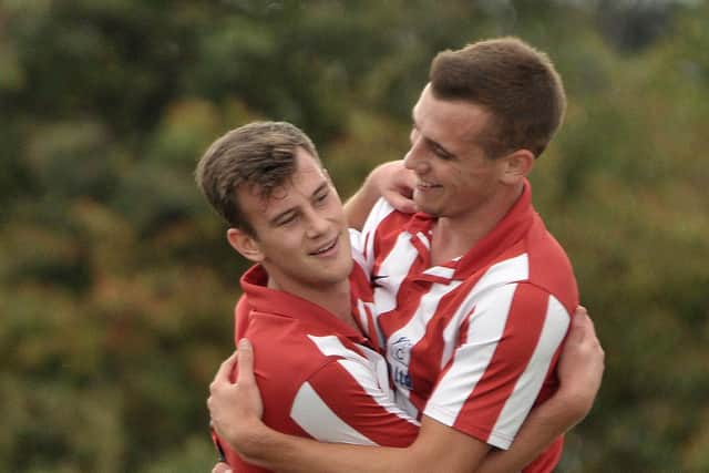 Danny Rimmer, left, celebrates a Baffins goal in the Hampshire Premier League with Jason Parish in 2014. Pic Mick Young.