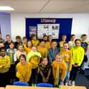 Gomer Junior School Year 6 pupils dressed in yellow to support World Mental Health Day.
