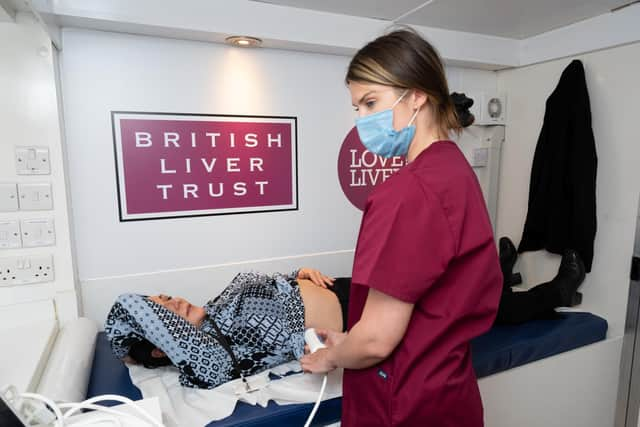 The British Liver Trust bring their Love Your Liver unit to Commercial Road in Portsmouth on Friday 10th June. Picture by Nigel Hillier