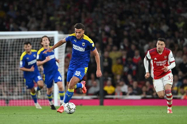 AFC Wimbledon's Nesta Guinness-Walker. (Photo by JUSTIN TALLIS/AFP via Getty Images).