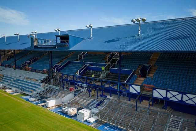 The restored South Stand truss can be glimpsed on the right of the middle section as work continues ahead of the new season. Picture: Michael Woods/Solent Sky Services