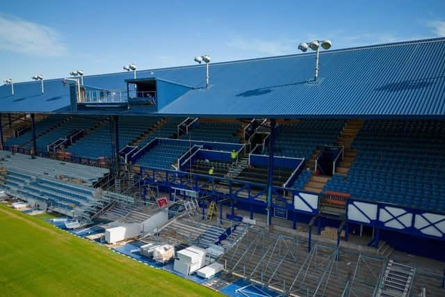 The restored South Stand truss can be glimpsed on the right of the middle section as work continues ahead of the new season. Picture: Michael Woods/Solent Sky Services