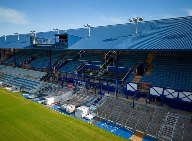 The restored South Stand truss can be glimpsed on the right of the middle section as work continues ahead of the new season. Picture: Michael Woods/Solent Sky Services