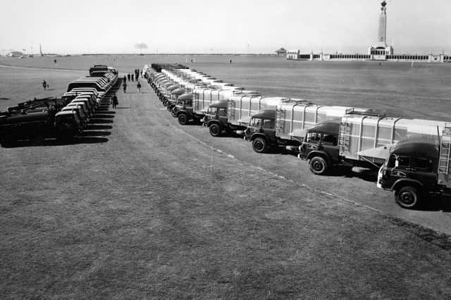 A fleet of Portsmouth City Council Bedford dustcarts and drain cleaners lined up on Southsea Common. They were provided by USG in 1969.