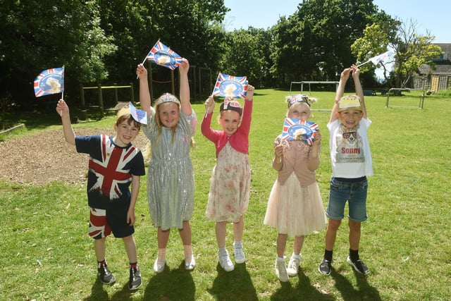 Alverstoke Infant School celebrating The Queen's Platinum Jubilee. From left: Harry Ellwood (6), Clara Rice (5), Lucy Twigg (7), Esther Davis (7) and Sonny Smith (7).
