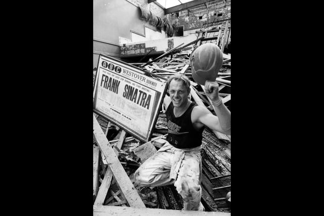 AG Green machine operator Mark Mansfield aiding in demolishing th Old Empire Cinema in East Street, Havant on August 26 1994. The News PP3377