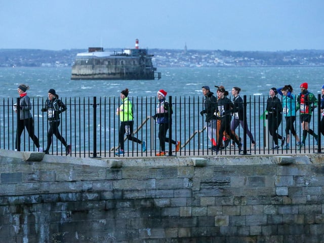 A number of runners took to the picturesque coastal route to take on the Portsmouth Coastal Waterside Marathon, Festive Half Marathon, as well as the Southsea 5k and 10k Turkey Trot. Picture: Chris  Moorhouse (221224-15)