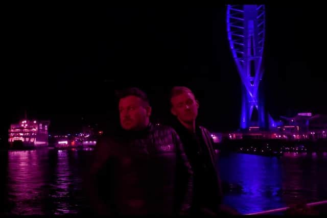 Councillor Rob New, left, is part of a local LGBT band called White Noise Fanatics with his friend and roommate Aled Price, right. The duo are pictured in front of the Spinnaker Tower.
