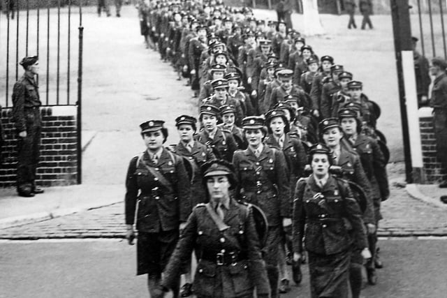 The Auxiliary Territorial  Service (ATC) at Hilsea.  Seen leaving Hilsea RAOC Barracks  are member of ATC. It might be a march out after disbanded.