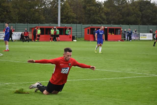 Calum Benfield celebrates his equaliser against Jersey Bulls. Picture by Paul Proctor