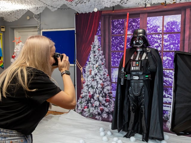 Darth drops in for a festive photo at the Fratton Christmas Fair. Picture: Mike Cooter (091223)